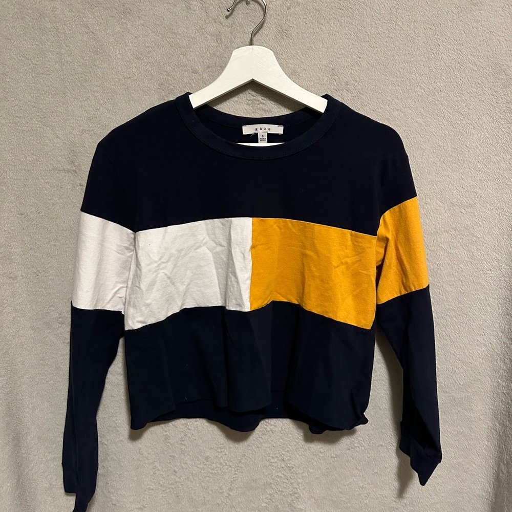 Dark blue crop top with yellow and white in the middle